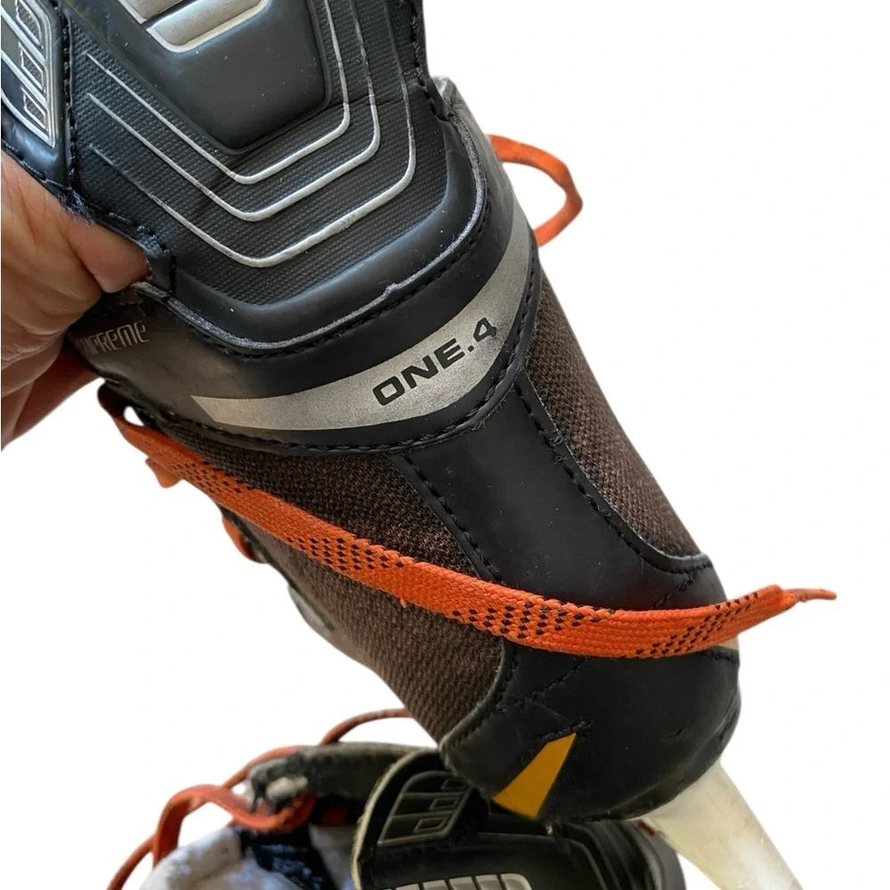 Bauer Supreme One.8, 4.5 D hockey skates, black orange laces